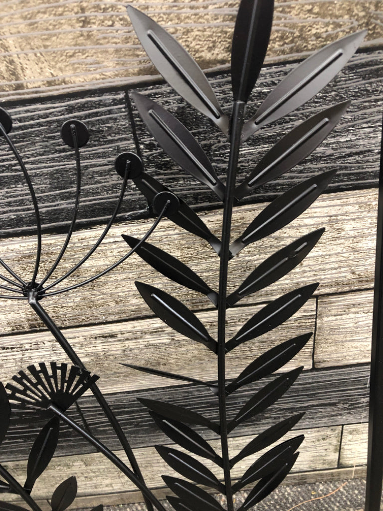 BLACK METAL DANDELION AND LEAVES WALL HANGING.