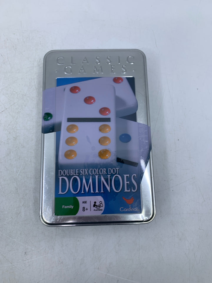 NIP DOUBLE SIX COLOR DOMINOES.