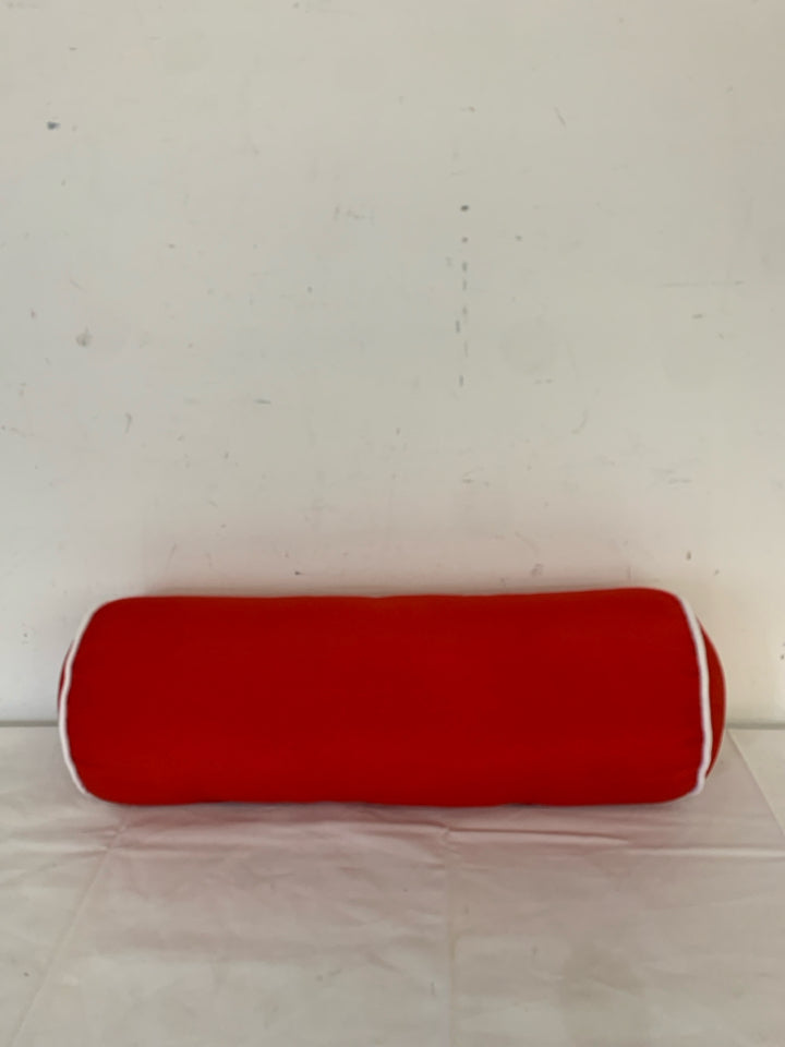 RED AND WHITE CYLINDER PILLOW.