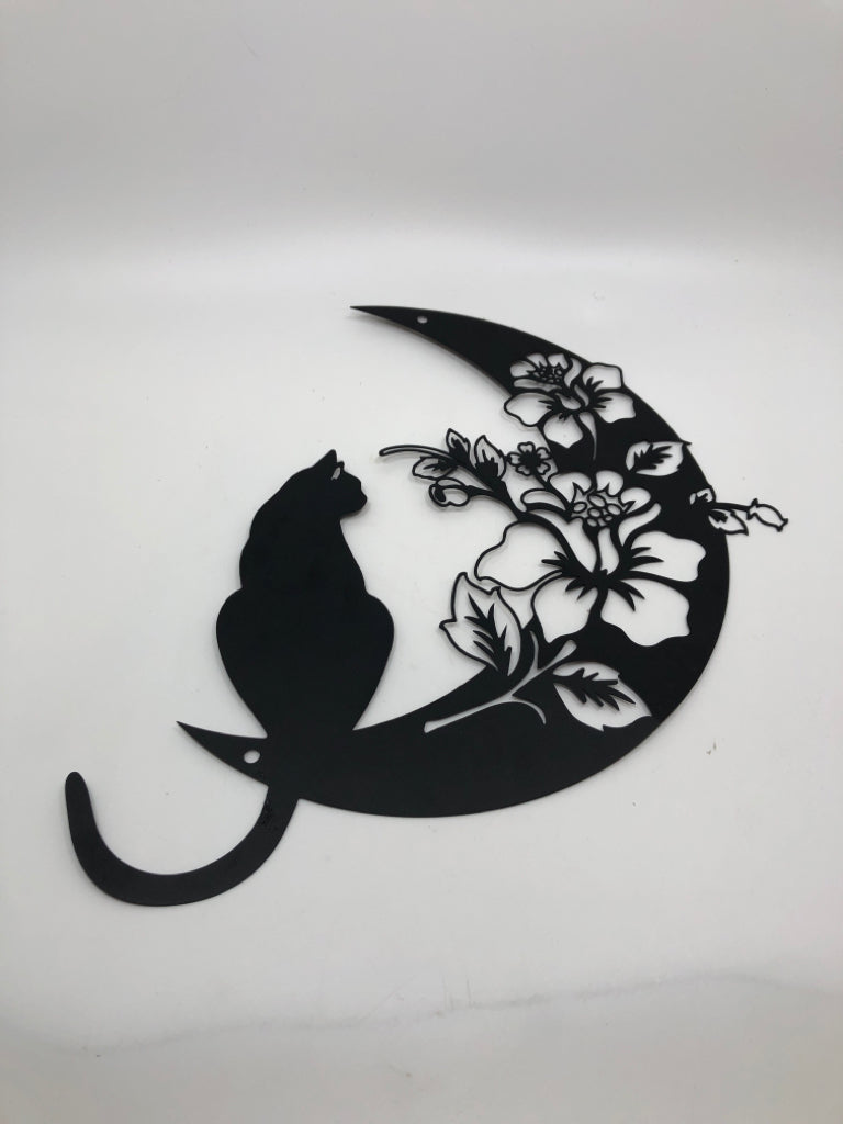 CAT AND FLOWERS ON MOON SILHOUETTE.