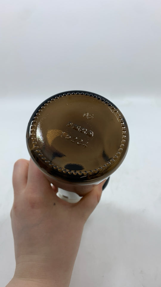BROWN GLASS BOTTLE W/PLASTIC POUR SPOUT.
