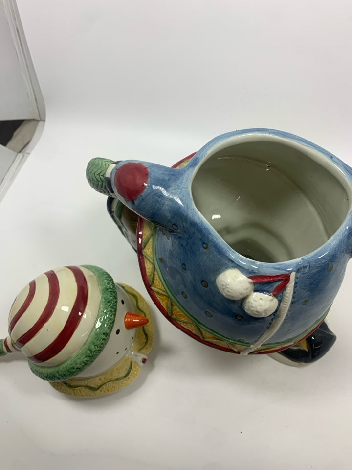 SKATING SNOWMAN COOKIE JAR.