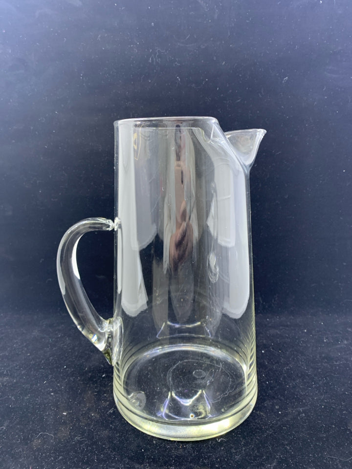 TALL GLASS PITCHER W ICE LIP.