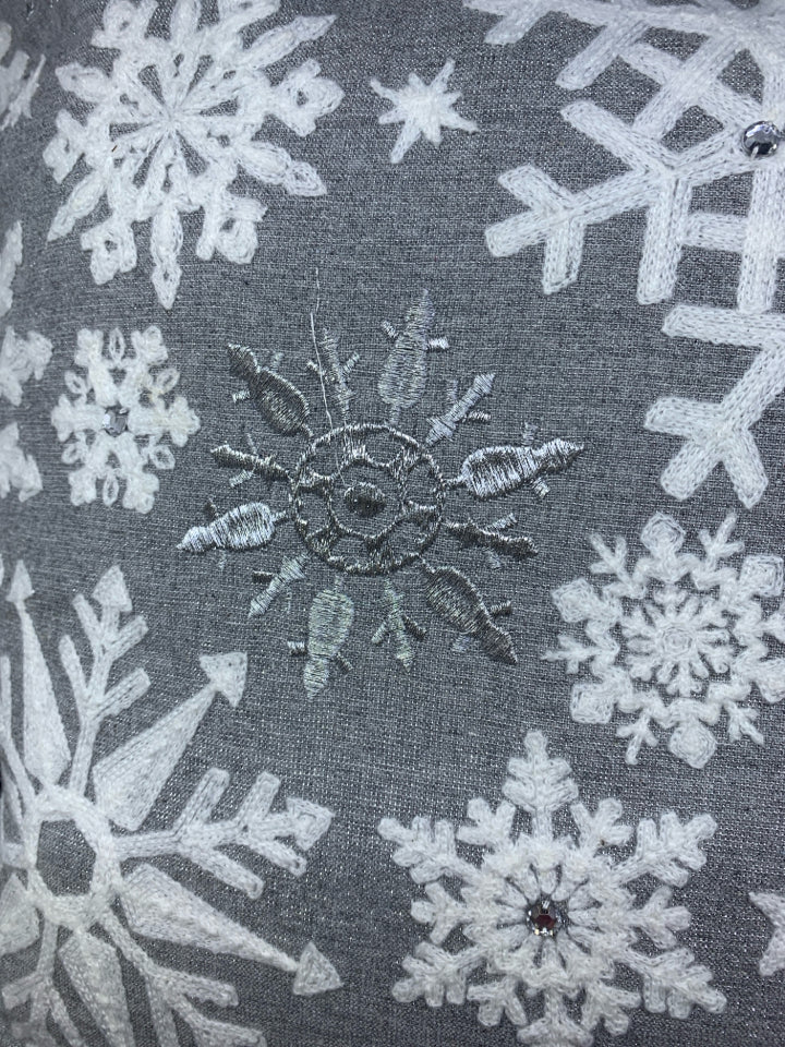 SILVER SNOWFLAKE SQUARE PILLOW.
