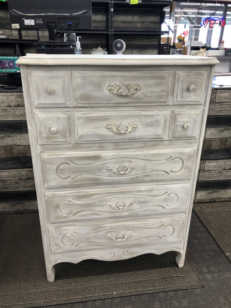 DISTRESSED WHITE WOODEN DRESSER.
