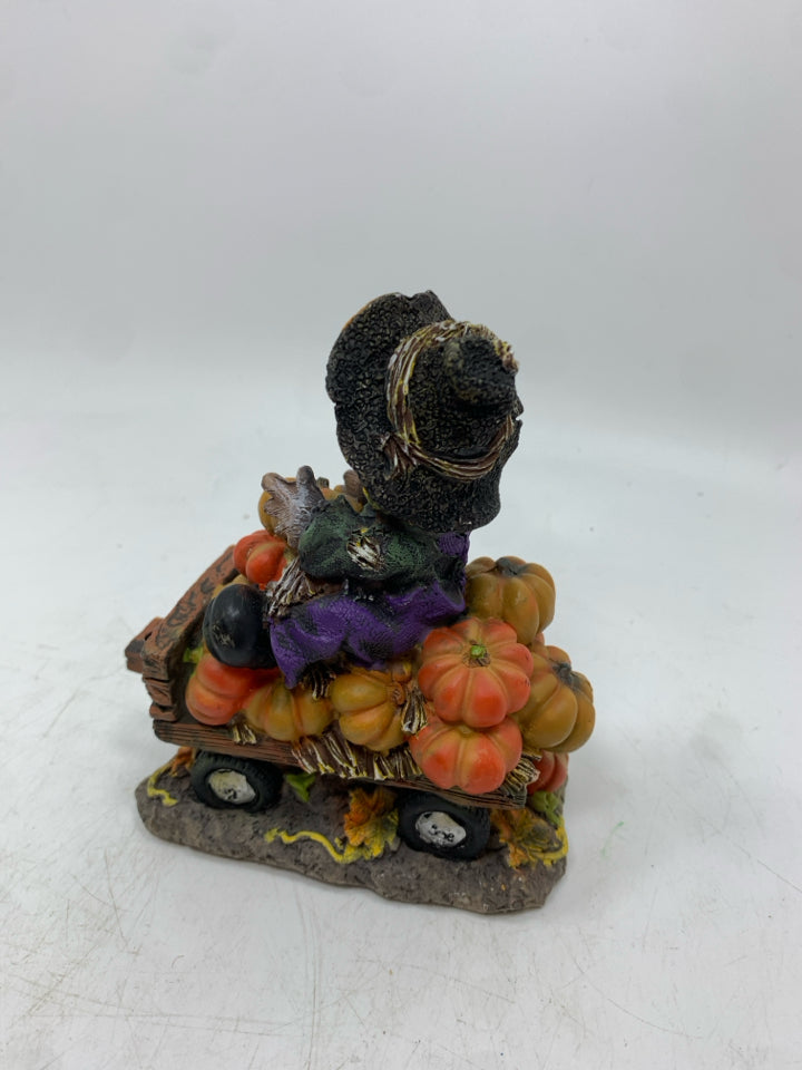 SCARECROW ON PUMPKIN HAY RIDE FIGURINE.