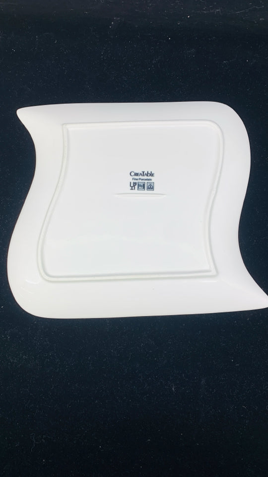 4 SQUARE WHITE DINNER PLATES.