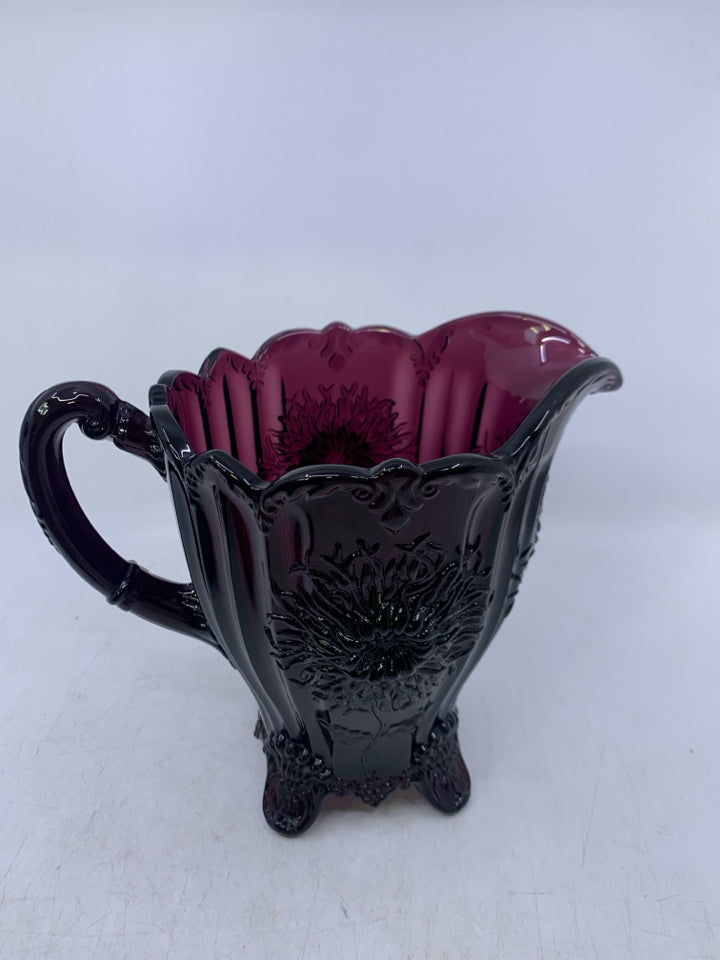 FOOTED DARK PURPLE W/ EMBOSSED SUNFLOWERS.