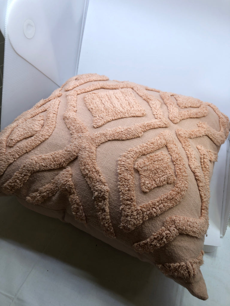 LARGE PINK TEXTURED PILLOW.