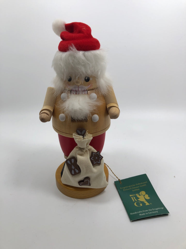 RG GERMAN- SANTA NUT CRACKER W/ BAG OF COOKIES.