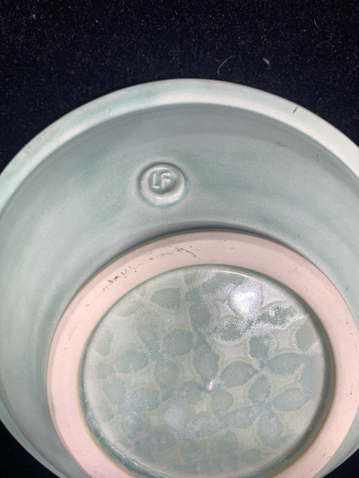 LF STAMPED MINT GREEN POTTERY BOWL W/ DESIGNS.