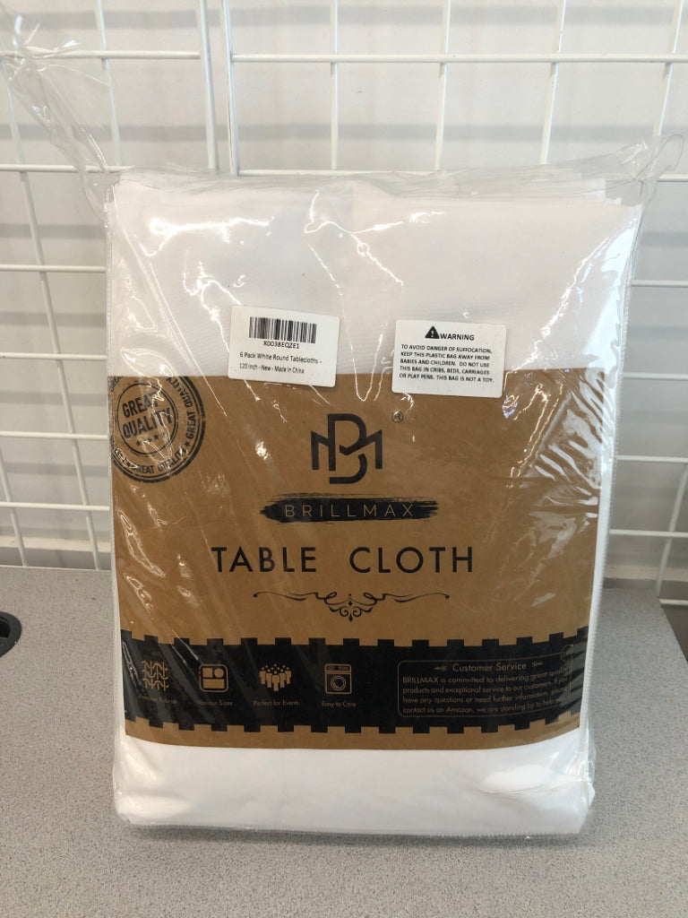NIP 6PC WHITE ROUND TABLECLOTHS.