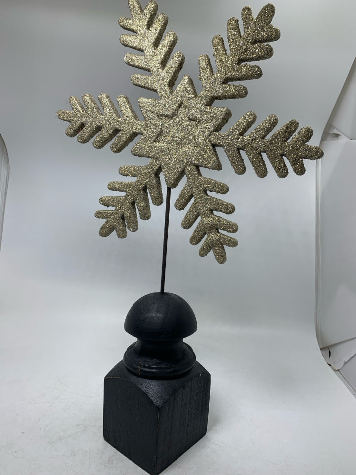BLACK WOOD BASE W/ SPARKLE SNOWFLAKE.