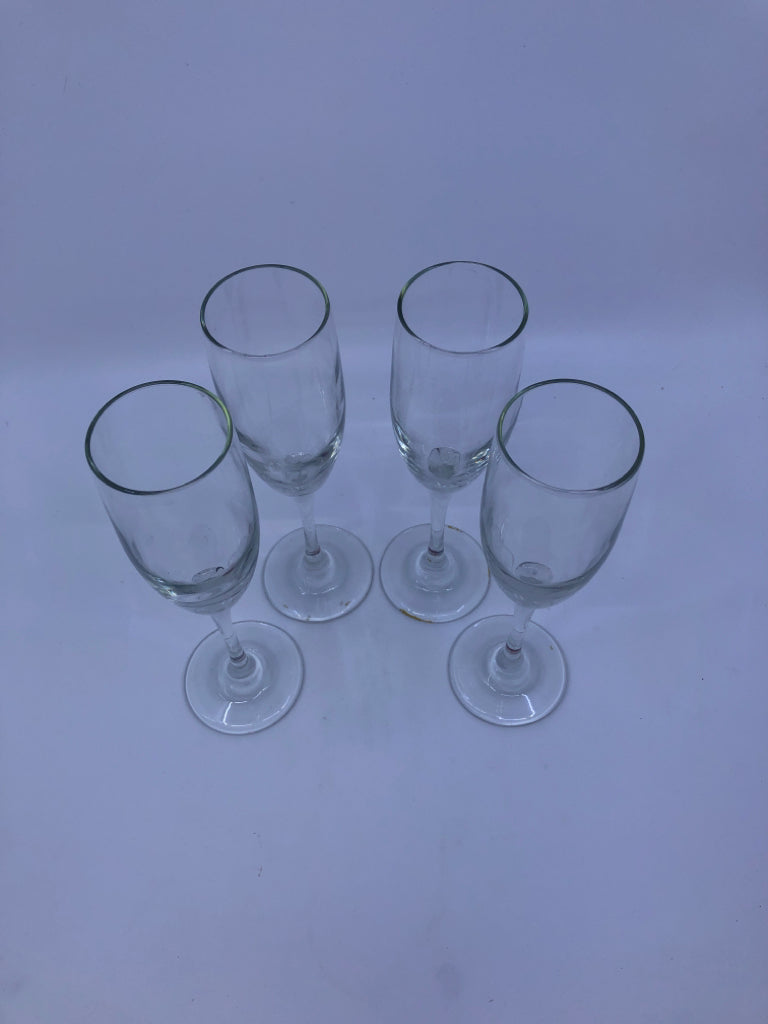 4 CHAMPAGNE GLASSES.