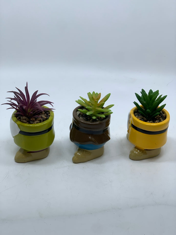 3 FAUX SUCCULENTS IN RESIN 7 DWARFS PLANTERS.