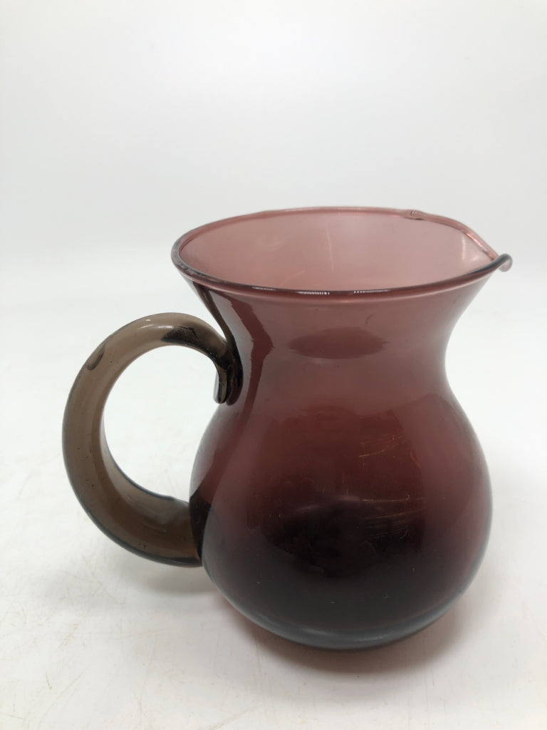 SMALL PURPLE GLASS PITCHER.