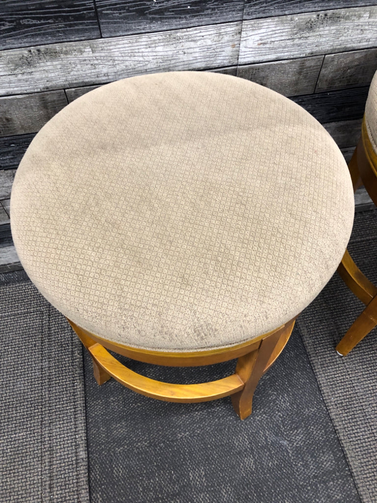 2PC WOODEN SWIVEL STOOLS W/BEIGE CUSHION.