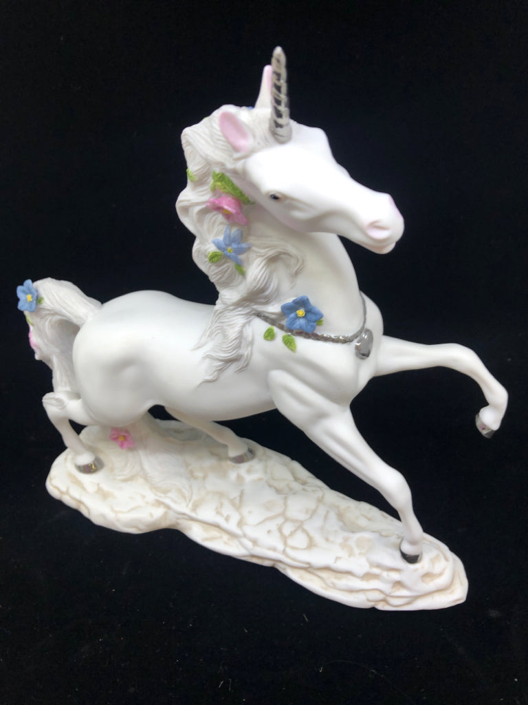 CERAMIC UNICORN W PINK AND BLUE FLOWERS.