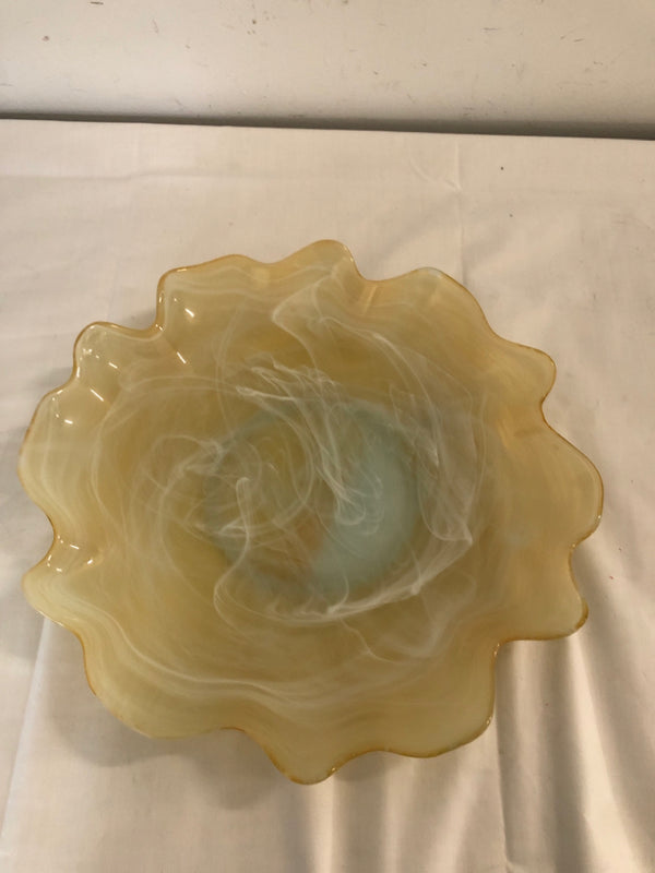 YELLOW SWIRLED GLASS CANDLE HOLDER.