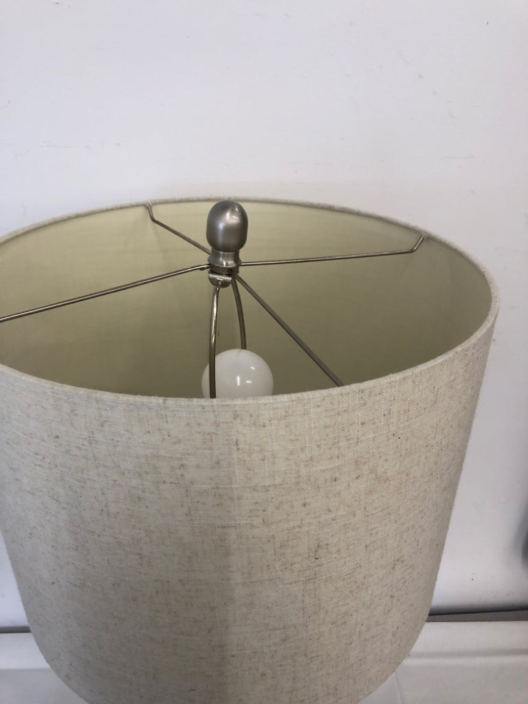 SILVER CUTOUT CYLINDER BASE LAMP W/ CREAM SHADE 3 WAY.