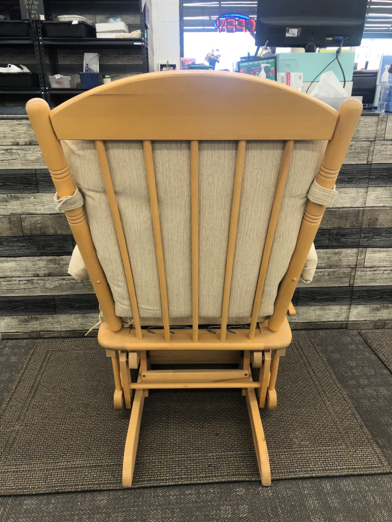 BLONDE WOOD SHERMAG CREAM CUSHION GLIDING ROCKER.