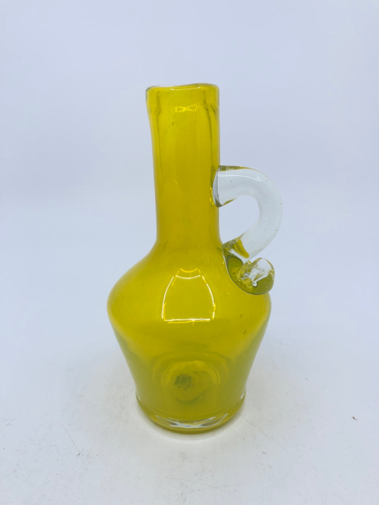 SMALL YELLOW GLASS PITCHER.