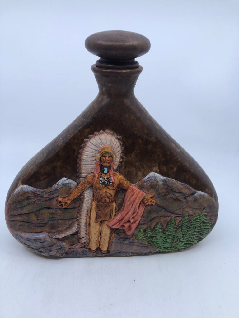 WIDE CERAMIC EMBOSSED INDIGENOUS MAN DECANTER W STOPPER.