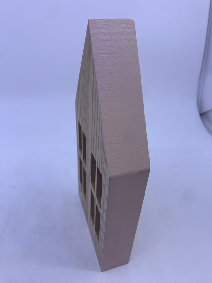 SMALL WOOD HOUSE W PINK SIDES.