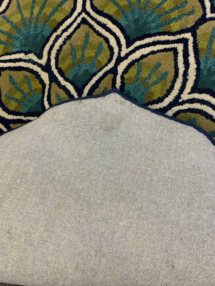 BLUE AND GREEN LOTUS FLOWER SHAPED RUG.