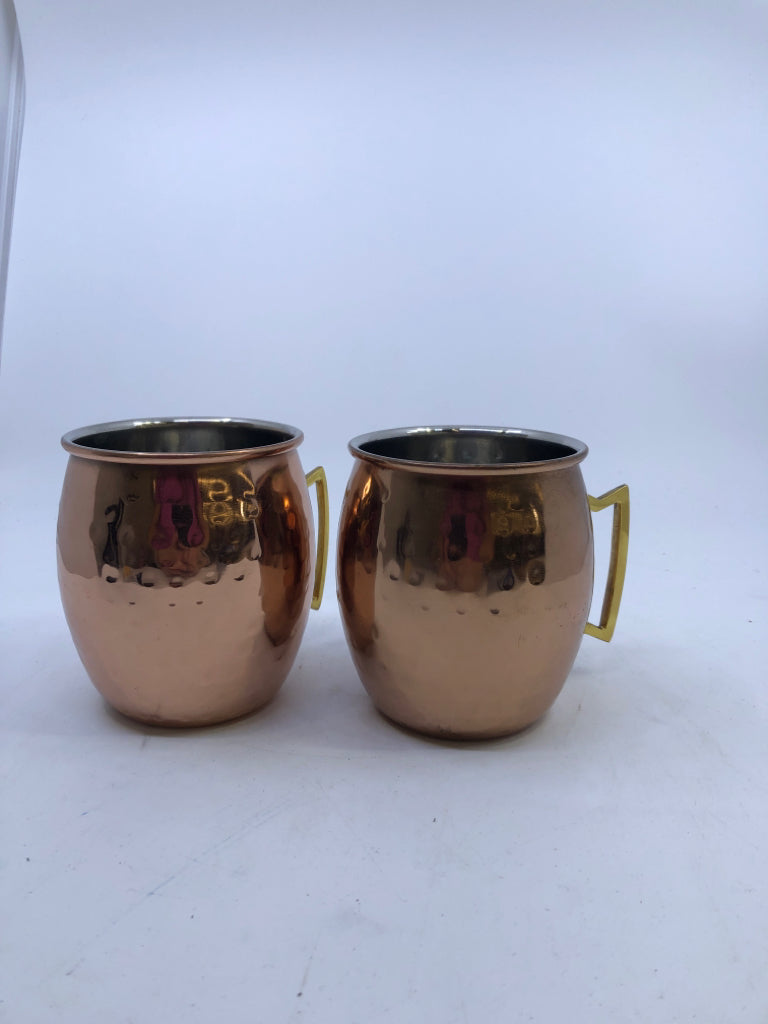 2 COPPER HAMMERED MUGS.