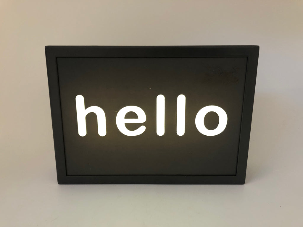 GRAY METAL LIGHT UP HELLO SHADOW BOX.