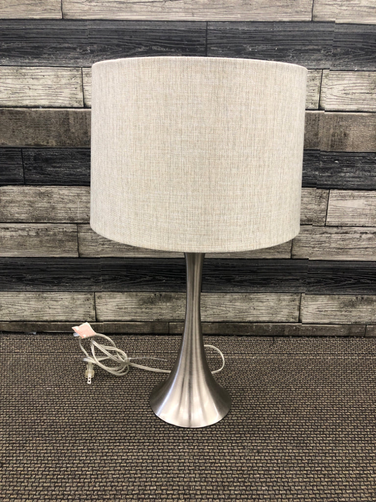 STAINLESS STEEL BASE LAMP W/ TEXTURED SHADE.