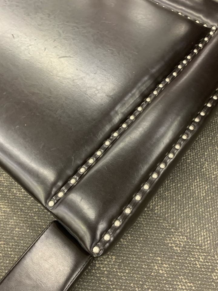 DARK FAUX LEATHER STUDDED QUEEN SIZED BED FRAME.