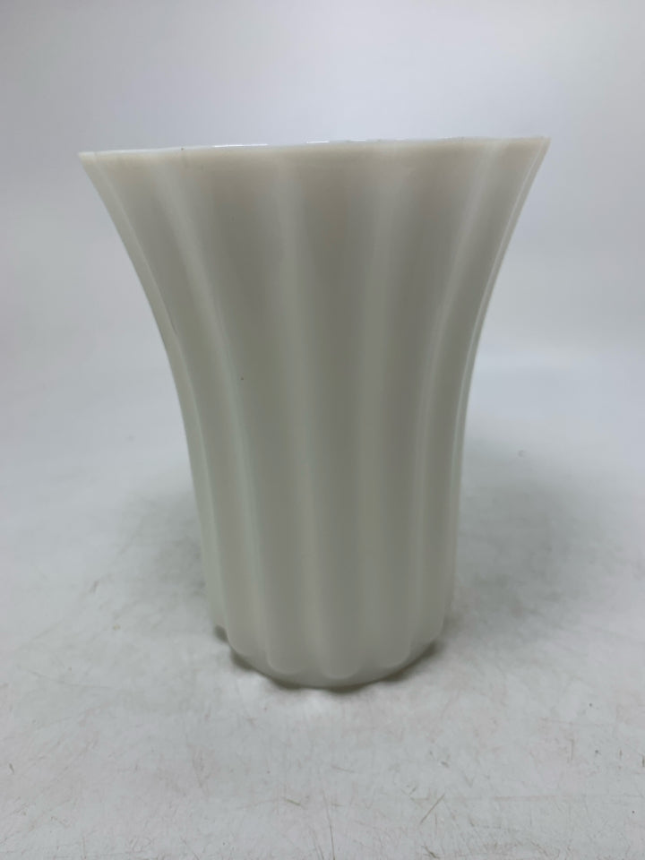 RIBBED MILK GLASS VASE W/ FLARED TOP.