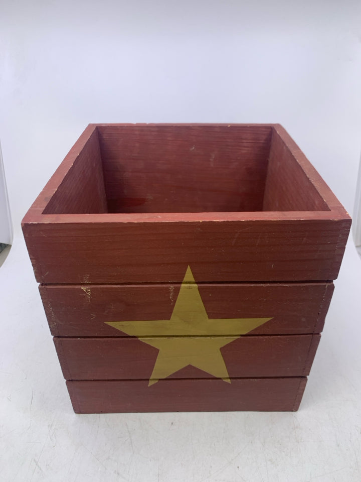 MAROON PAINTED BOX W/ YELLOW STAR.