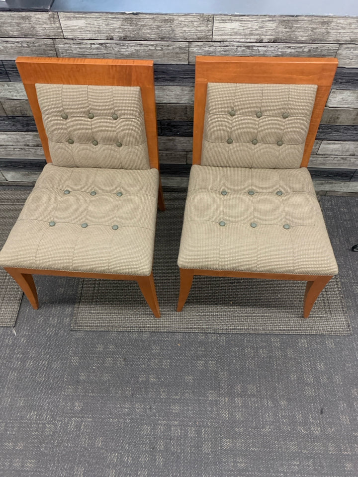 2 WOOD BASE ACCENT CHAIRS W GREEN AND CREAM PADDING.