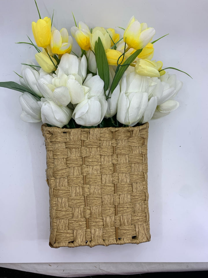 LIGHT WOVEN WALL BASKET W/ WHITE/YELLOW TULIPS.