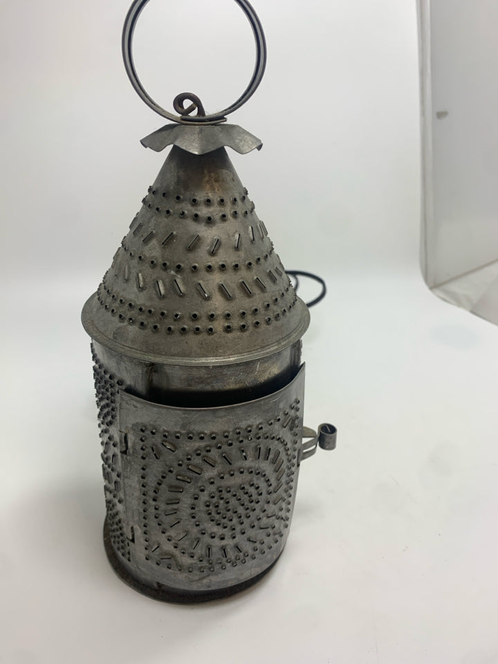 PUNCHED SILVER METAL LANTERN.
