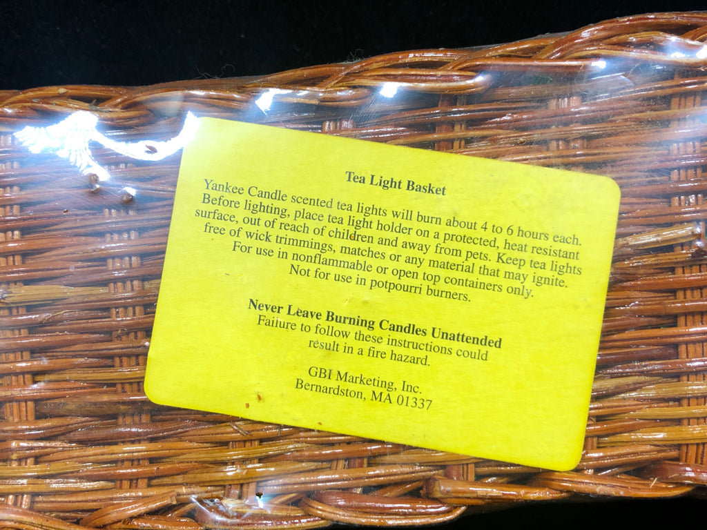 NIP PUMPKIN CANDLES IN BASKET.