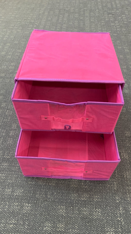 STACKED PINK & PURPLE COLLAPSING BINS.
