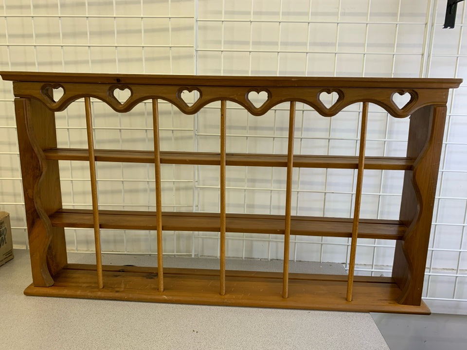 3 TIER WOOD SHELF W/ HEART CUTOUTS.