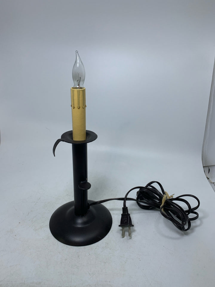 BROWN METAL BASE CANDLE LAMP.