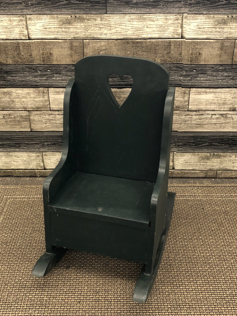 SMALL GREEN DECORTIVE ROCKING CHAIR.