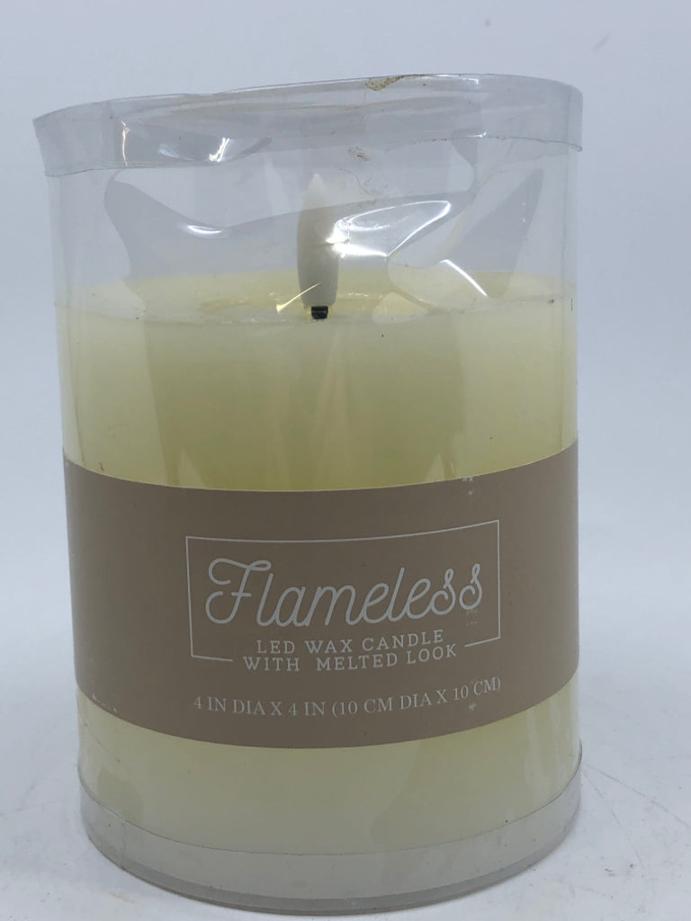 NIP FAUX BATTERY CANDLE.