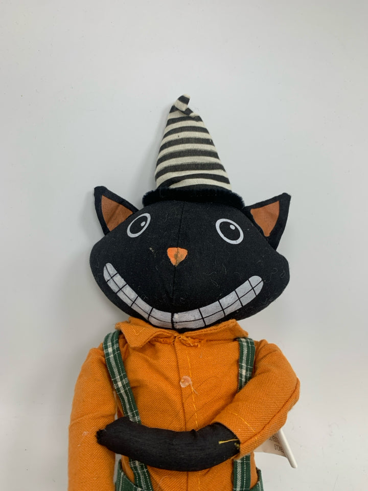 PLUSH BLACK CAT IN OVERALLS SHELF SITTER.