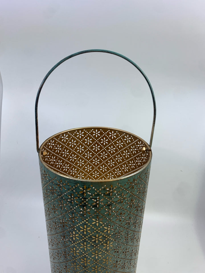 TEAL METAL CANDLE LANTERN W/ORNATE CUT OUT DESIGN W/LIGHT UP PILLAR CANDLE.