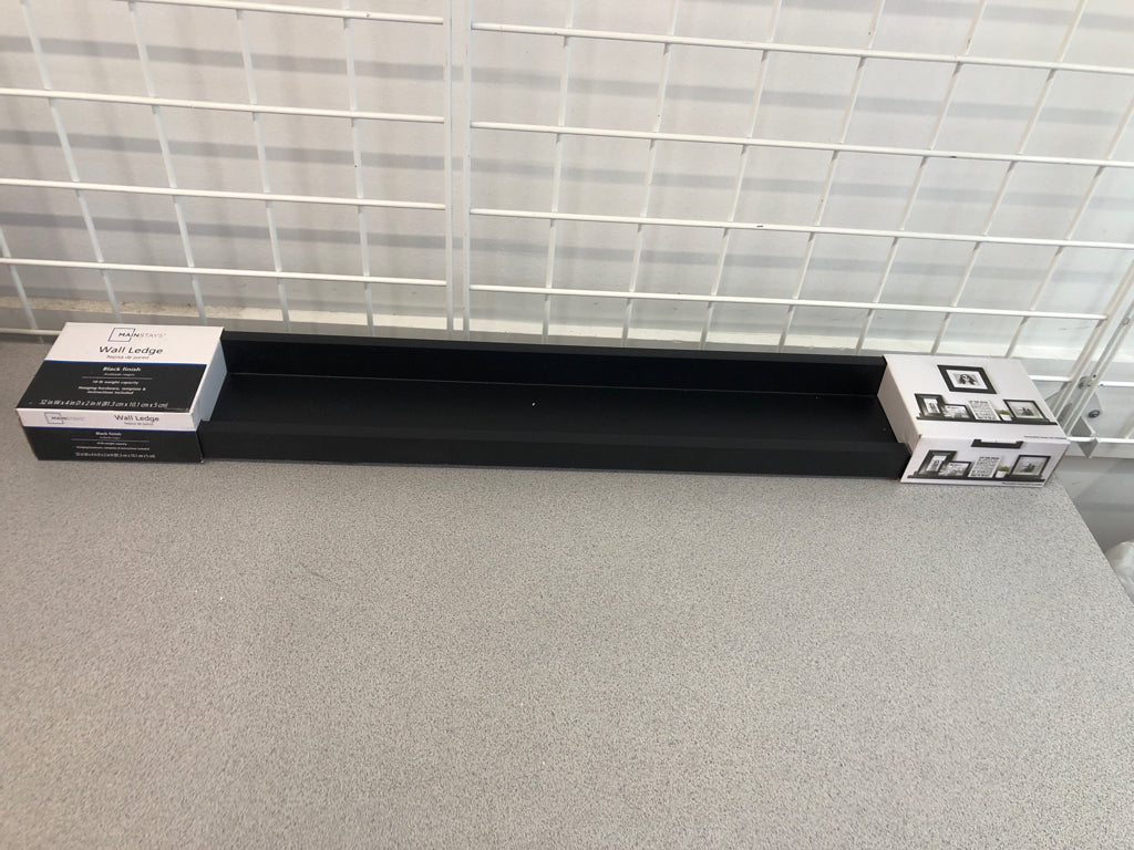 NIP BLACK WALL LEDGE.