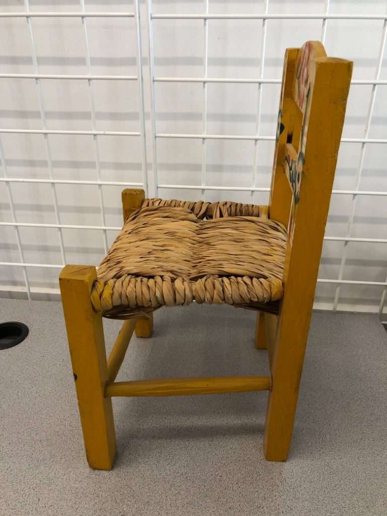 VTG FLORAL PAINTED DOLL CHAIR W/WICKER SEAT.
