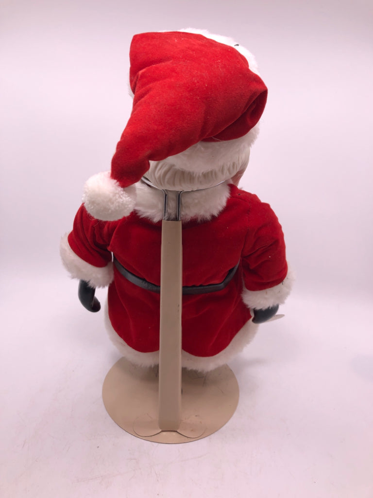LARGE PORCELAIN SANTA ON STAND.