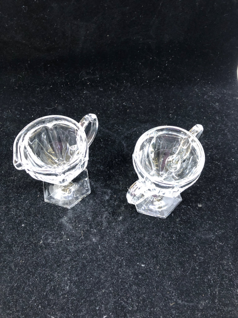2PC GLASS FOOTED SUGAR AND CREAMER SET.
